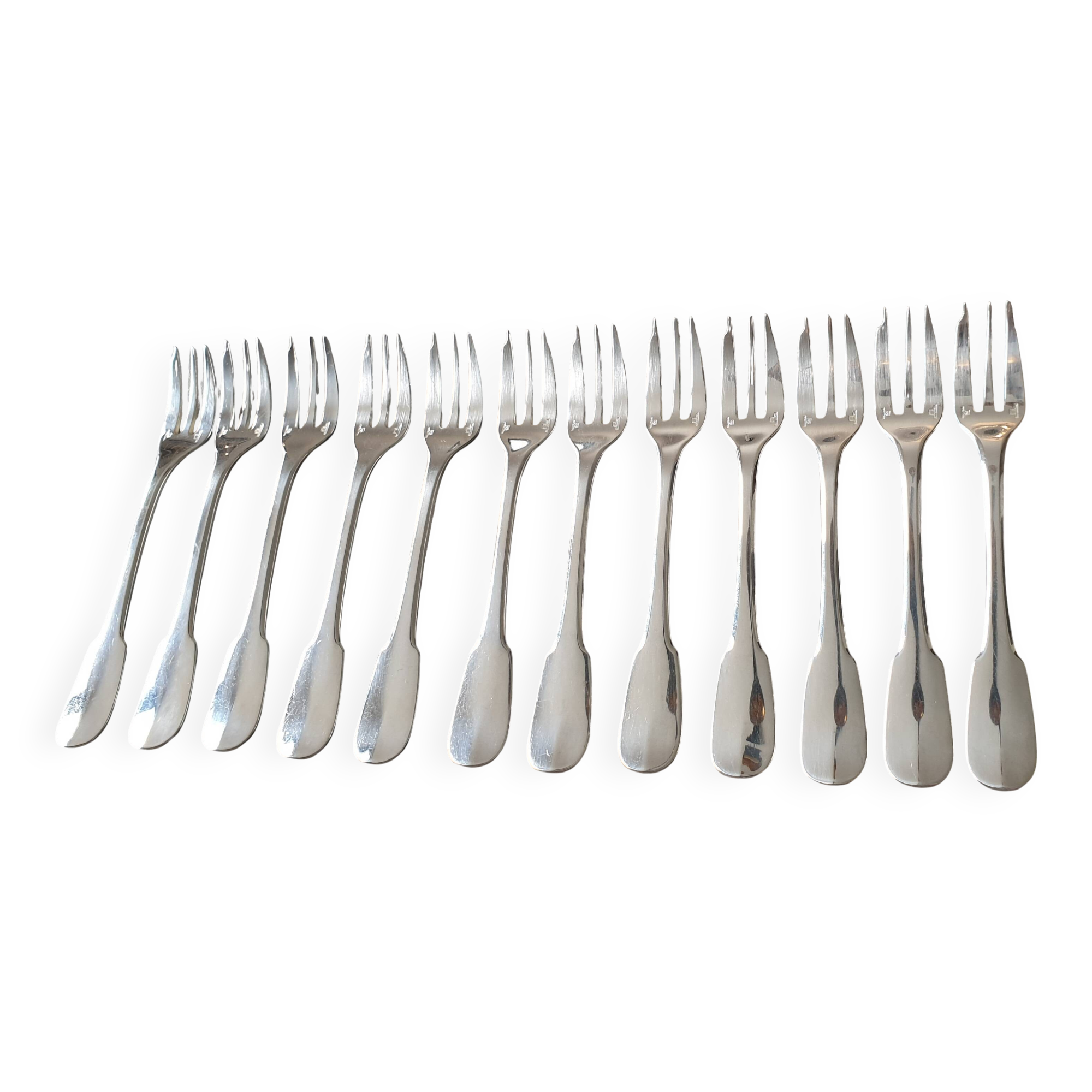Set of 12 dessert forks and a cake server.