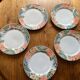 Set of 5 floral plates in vibrant colours, 1980s, vintage
