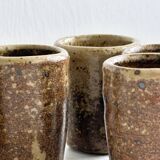 5 coquetiers en grès pyrite, shooter en céramique.