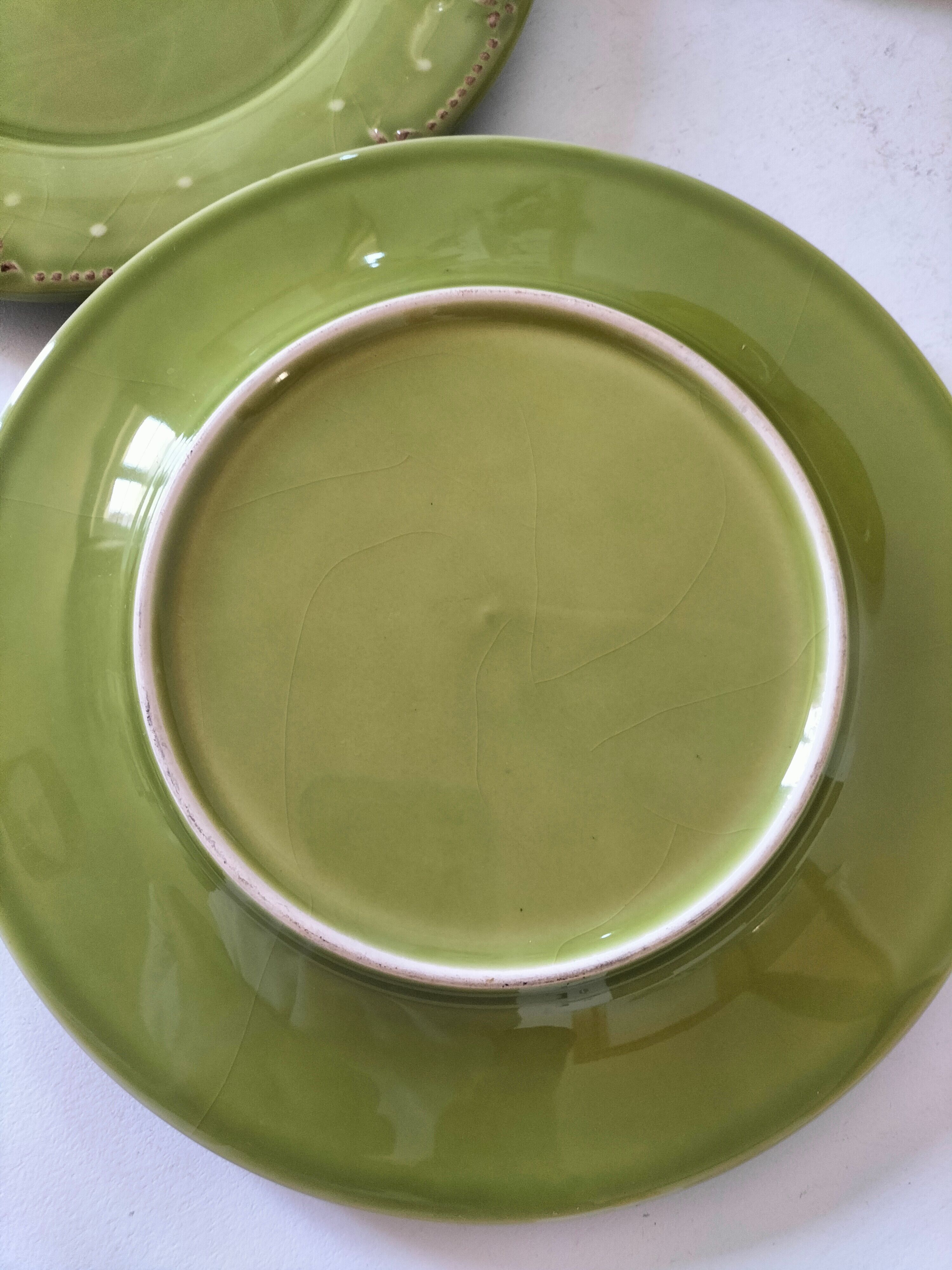 6 olive green plates with dotted relief, workshop ceramic style