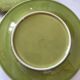 6 olive green plates with dotted relief, workshop ceramic style