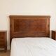 Double bed in Art Deco style with thuya burl wood and two bedside tables.
