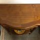 Cherry half-moon console with drawer and bottom shelf