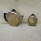 Set of a teapot and a silver metal sugar bowl