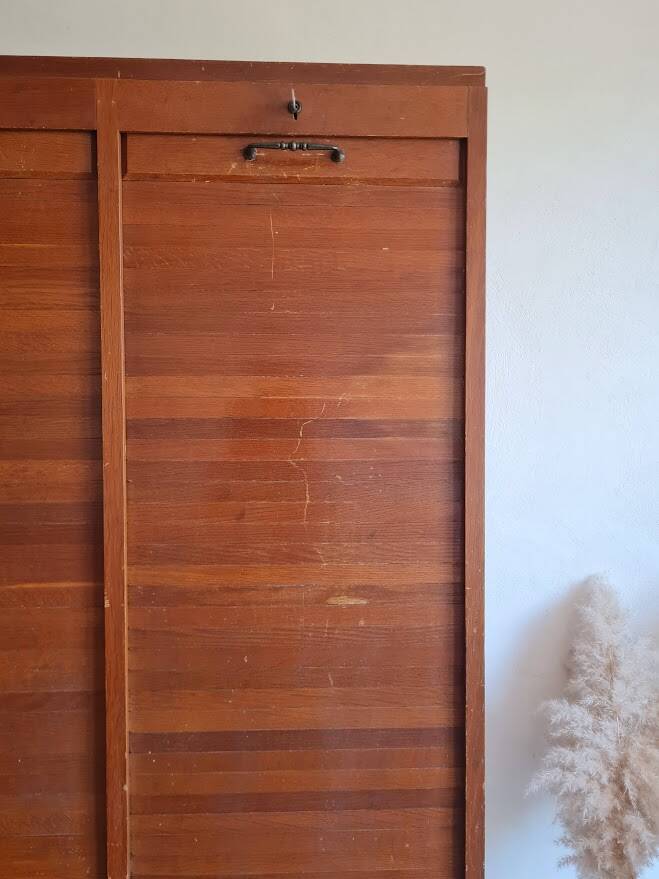 Vintage double curtain filing cabinet.