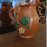 Glazed earth pitcher