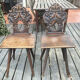 Pair of Alsatian chairs from the late 18th century with carved backs.