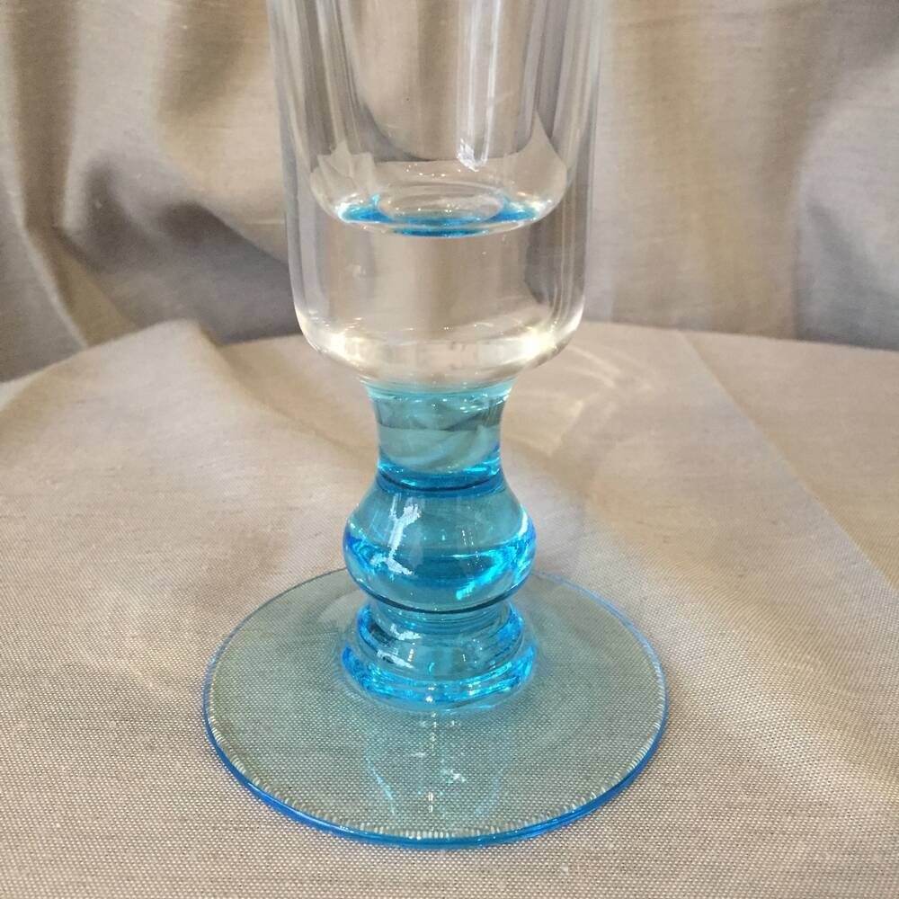 Pairs of transparent soliflores vases with blue legs