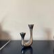 Designer cast iron candle holder