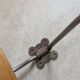 Three vintage coat hooks
