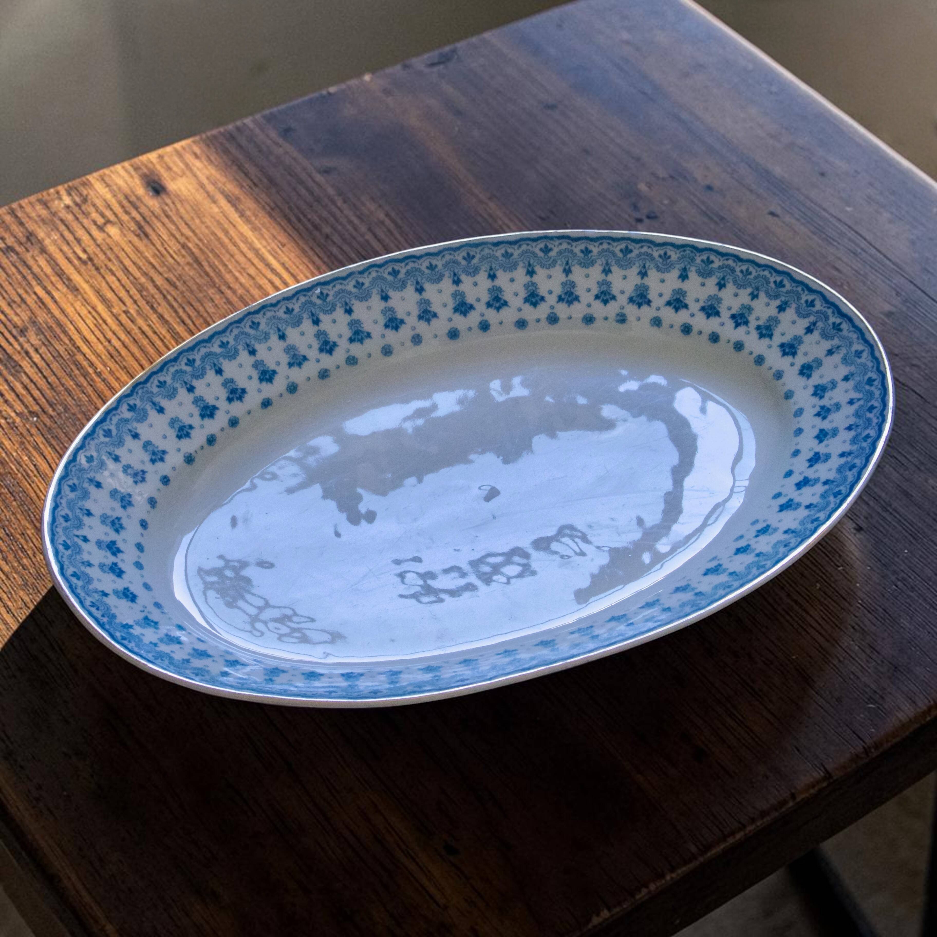Grand plat ovale ancien de 1909 en porcelaine Oscar Schaller