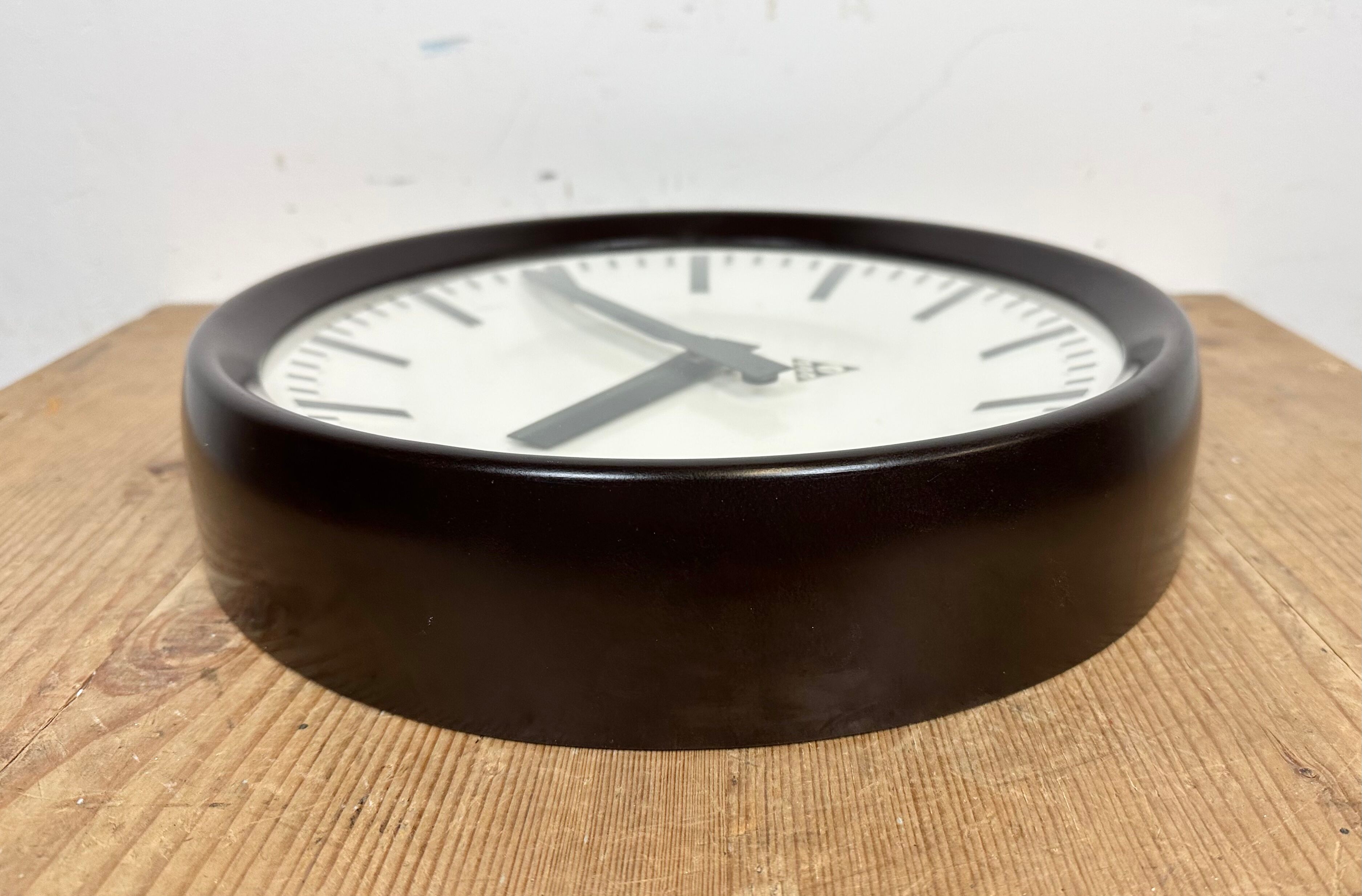 Industrial bakelite factory wall clock from Pragotron, 1960s