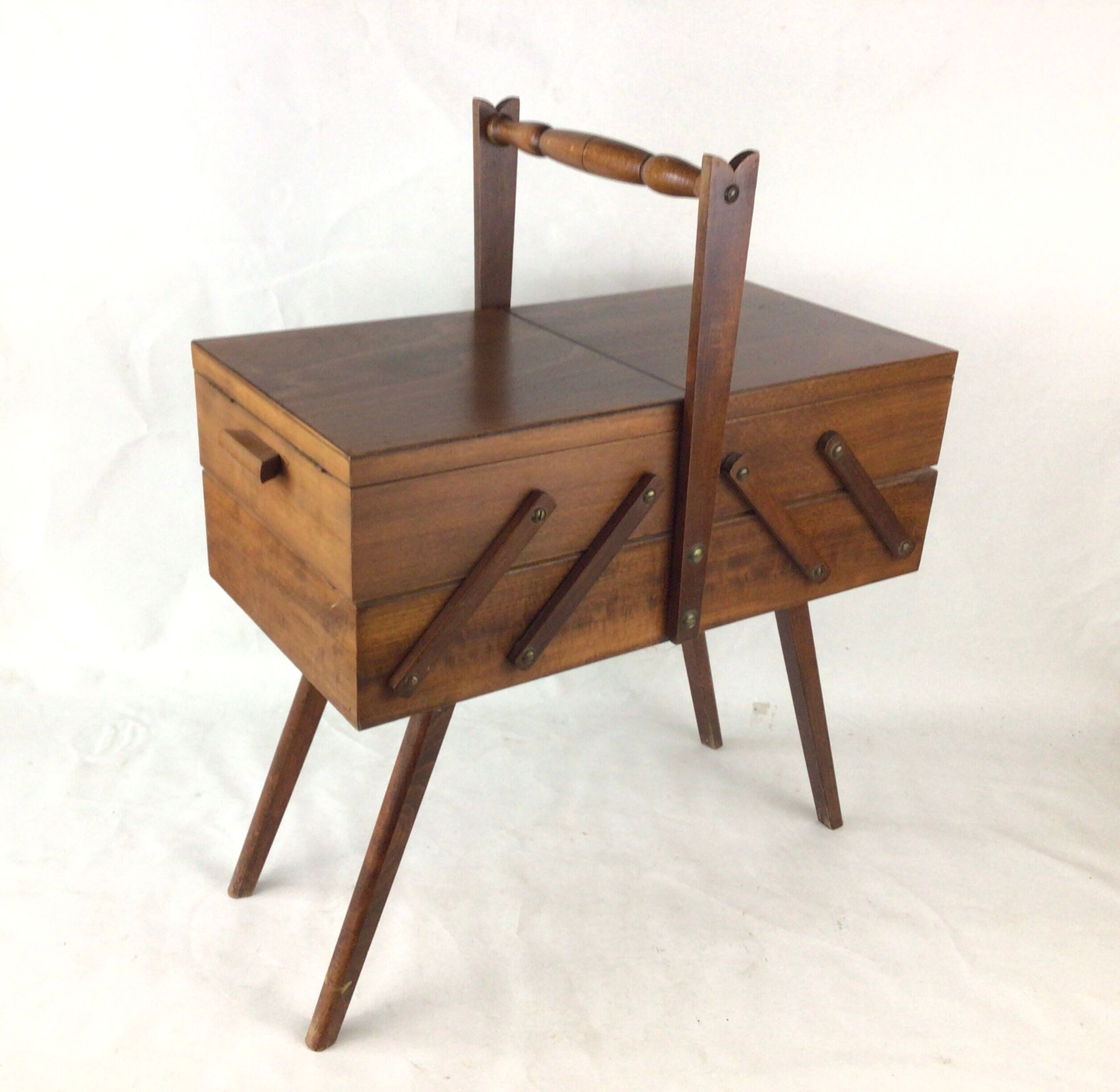 Worker on wooden compass feet