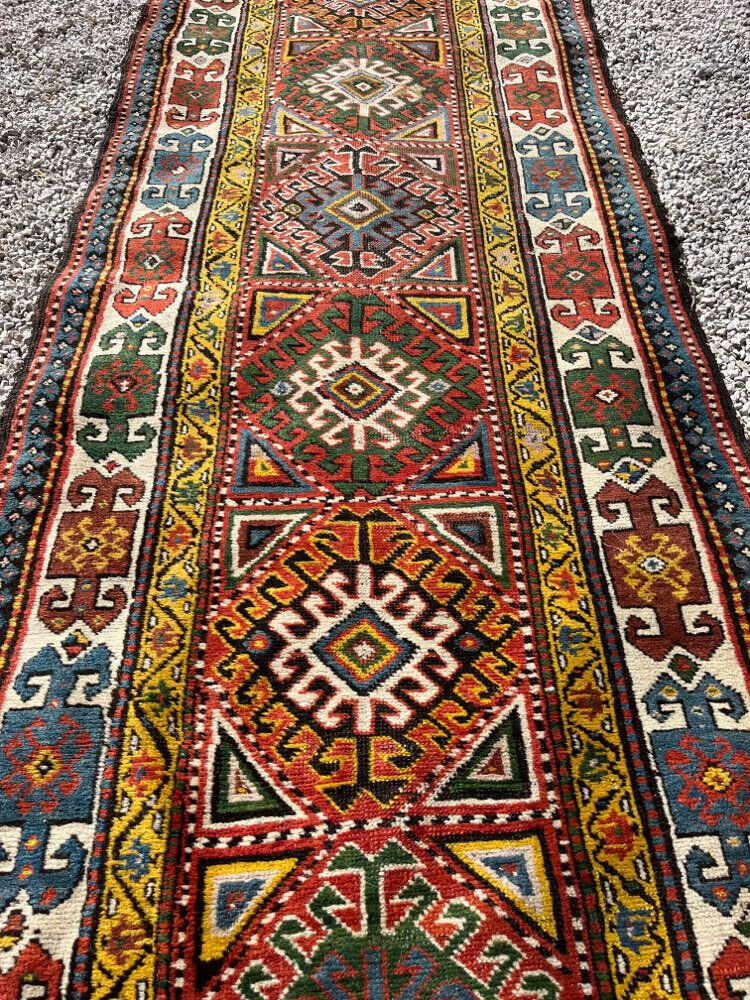 Long antique Persian carpet