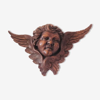 Decoration pediment in solid wood head of ancient angel