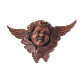 Decoration pediment in solid wood head of ancient angel