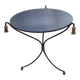 Table basse plateau verre noir et pompons bronze doré