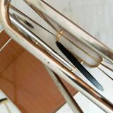 Rolling trolley in gold metal