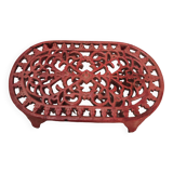 Vintage oval dark coral pink cast iron trivet