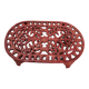 Vintage oval dark coral pink cast iron trivet