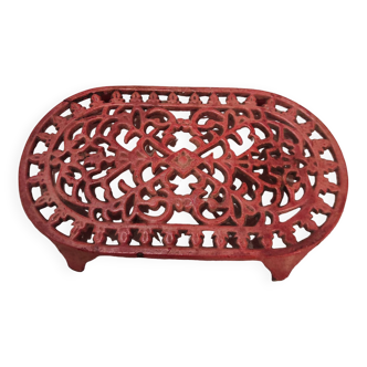 Vintage oval dark coral pink cast iron trivet