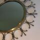 Sun mirror in brass and brushed steel