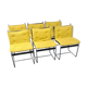 Un ensemble de 6 chaises à manger vintage à cadre métallique