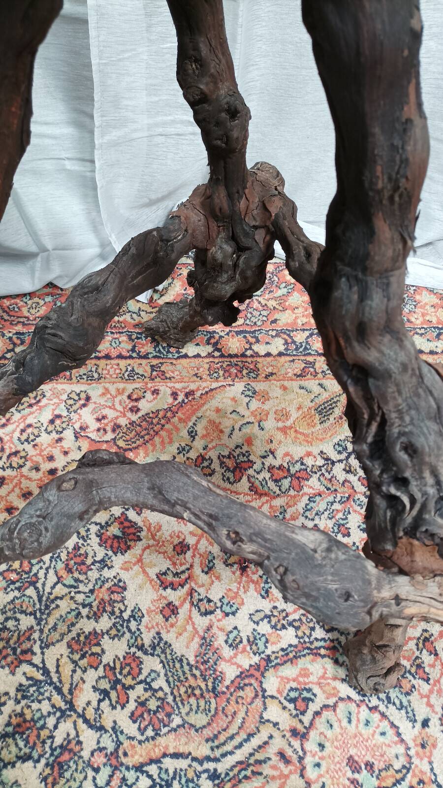 Brutalist bar stool made of vine wood