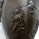 Patinated bronze lamp base medal