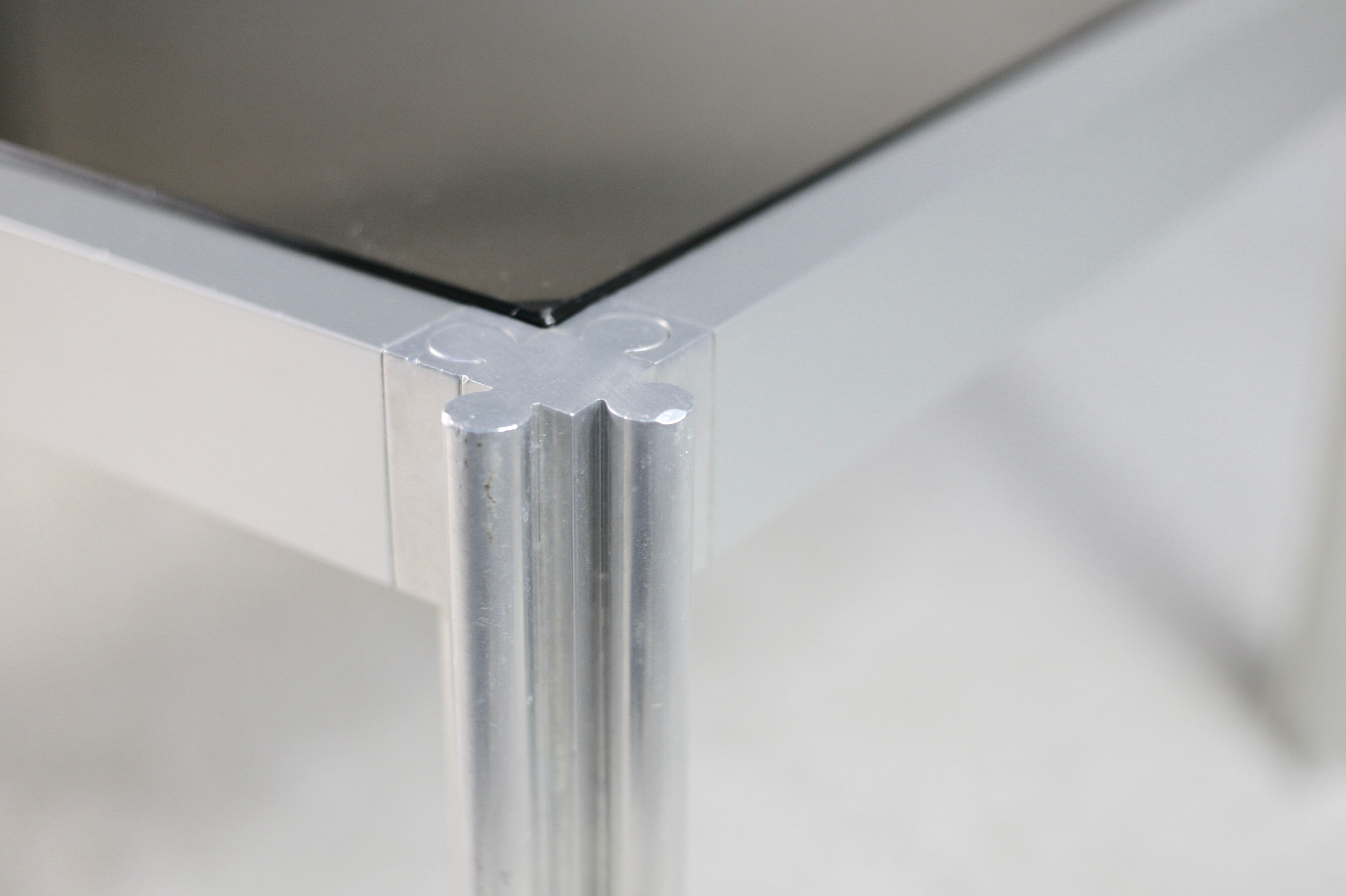 International Furniture. Steel coffee table and smoked glass. Circa 1970