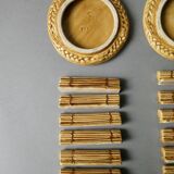 12 knife rests and 2 bottle coasters in earthenware