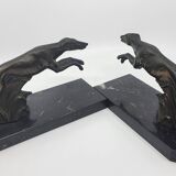 Pair of bookends, greyhounds in babbitt on black marble, Art Deco early 20th century