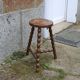 Tripod stool with bumped feet