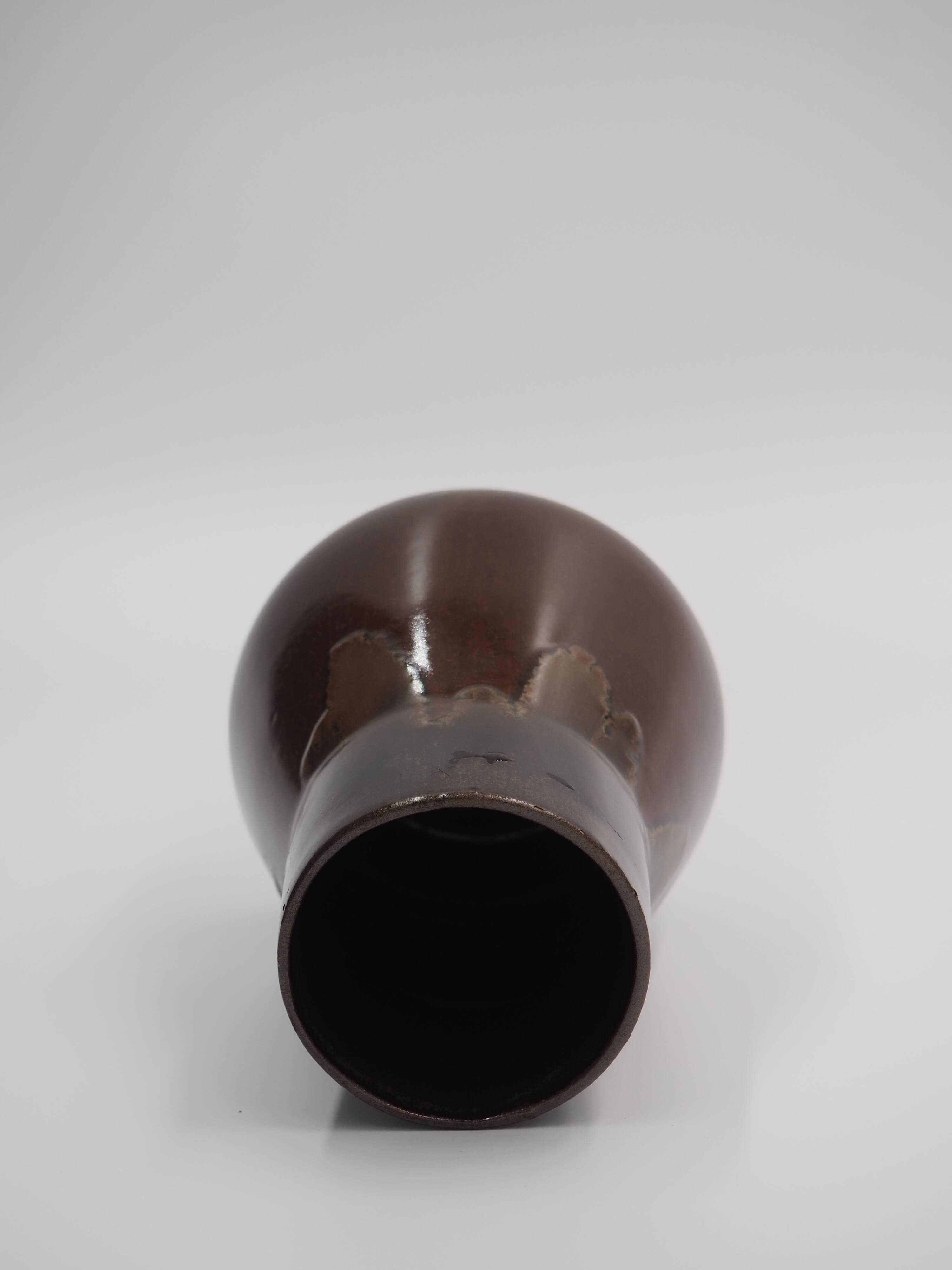 Small brown ceramic vase