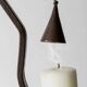 Vintage wrought iron candlestick from the 1960s, zigzag design with removable snuffer.