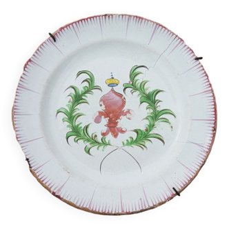 Old faience plate with wall support: fleur de lys