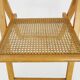 Pair of vintage folding chairs in beech and canework. Italy 70s