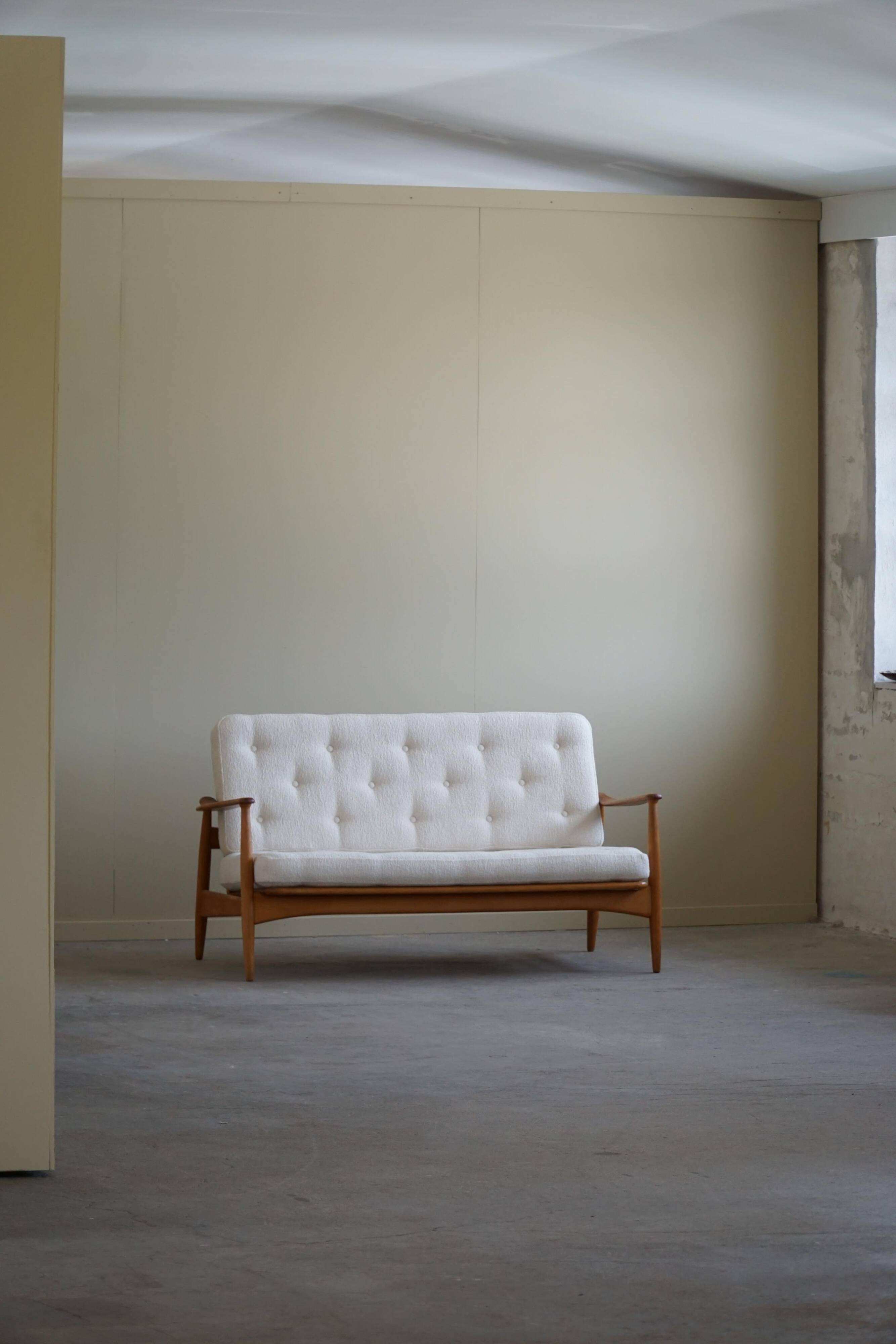 Two-seater canapé Arne Vodder, model Fd 161, reupholstered in boucle, 1950s.