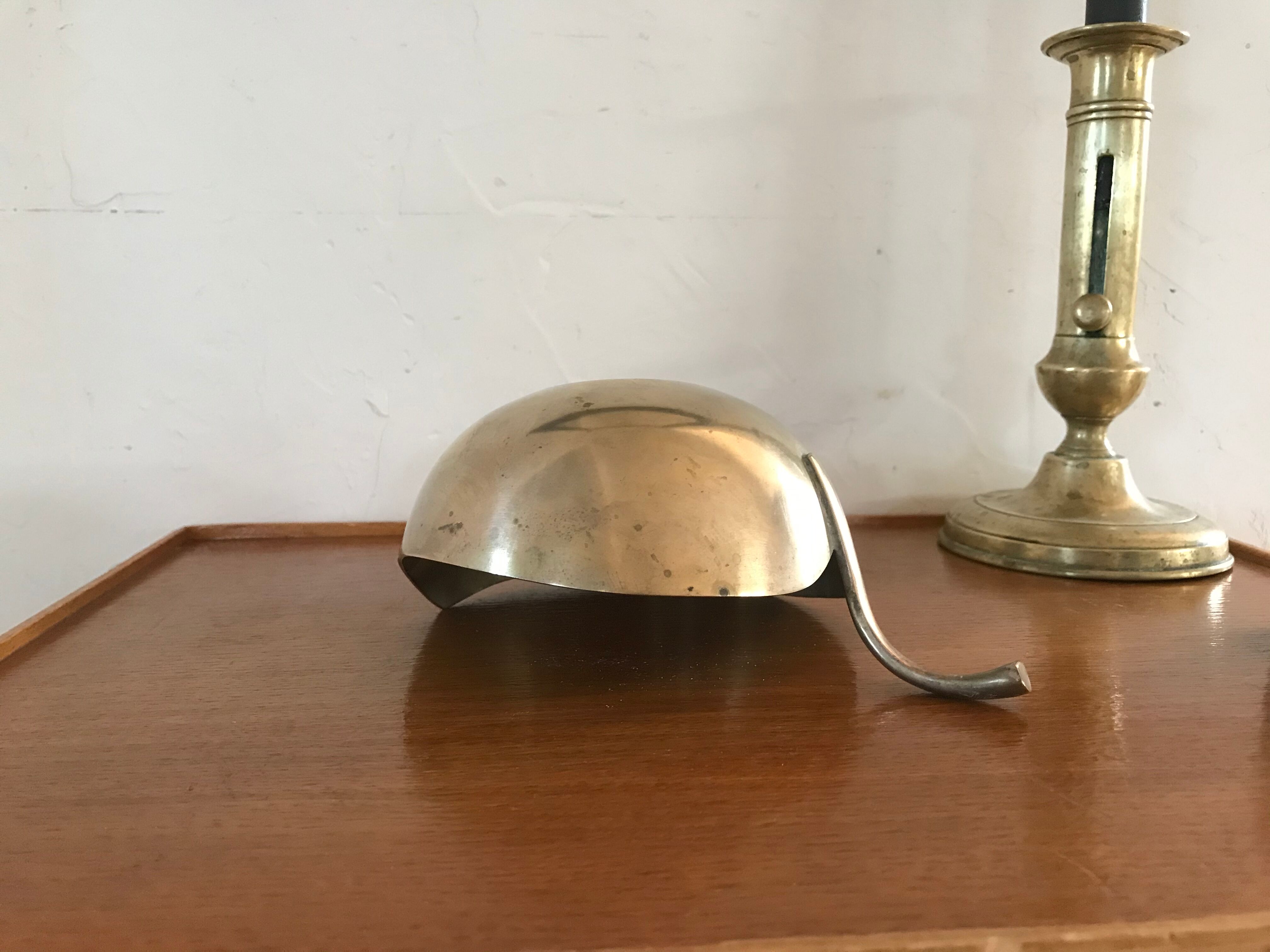 Empty brass apple pocket