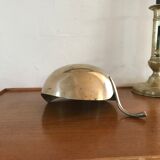 Empty brass apple pocket