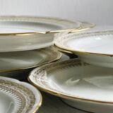12 Limoges porcelain dessert plates, gold decoration.