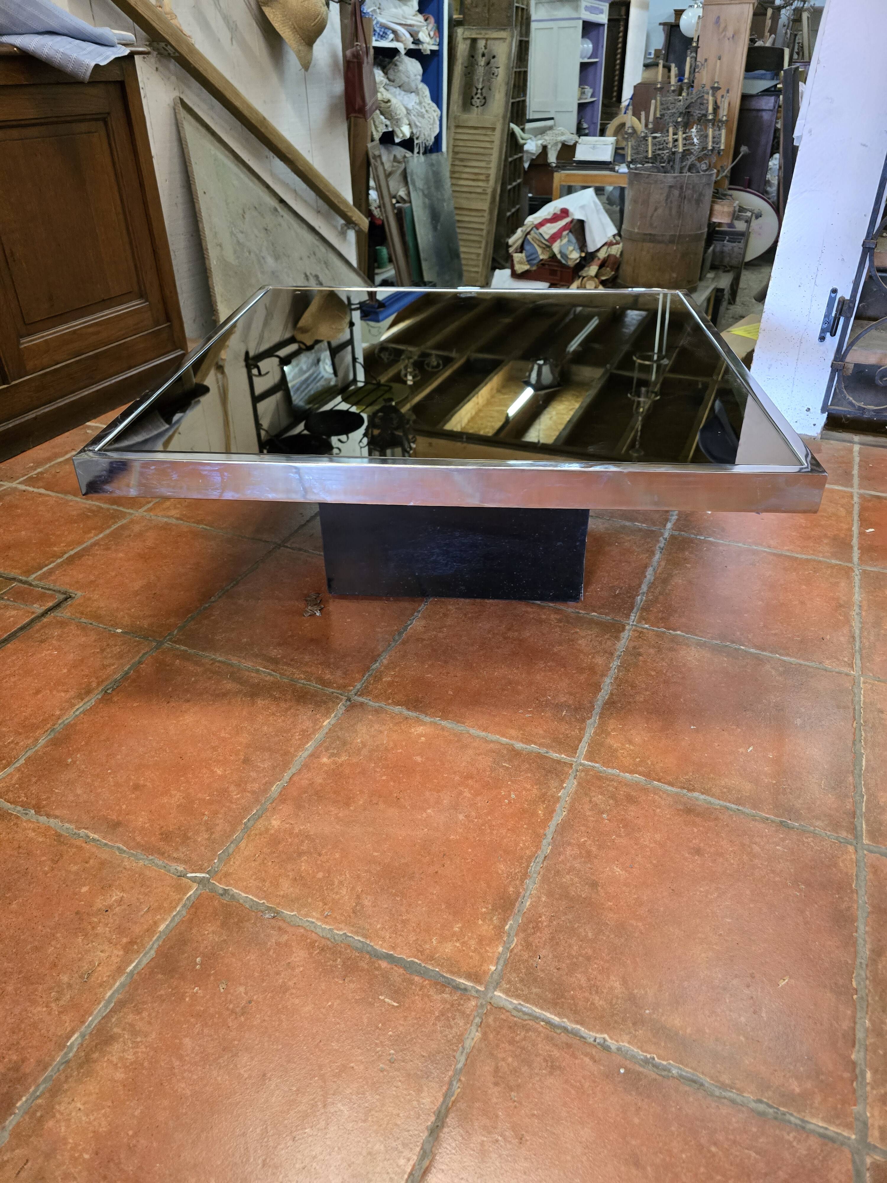 Chrome coffee table with smoked mirror top