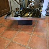 Chrome coffee table with smoked mirror top