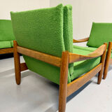 Living room sofa and Scandinavian design armchairs from the 1960s in green boucle.