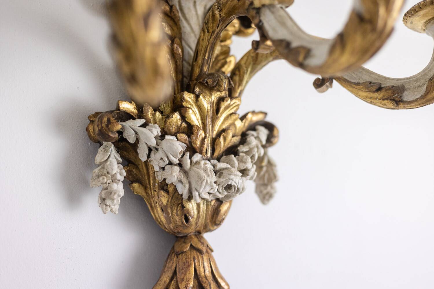 Pair of Louis XVI style wall lights in gilded and lacquered wood. Circa 1900.