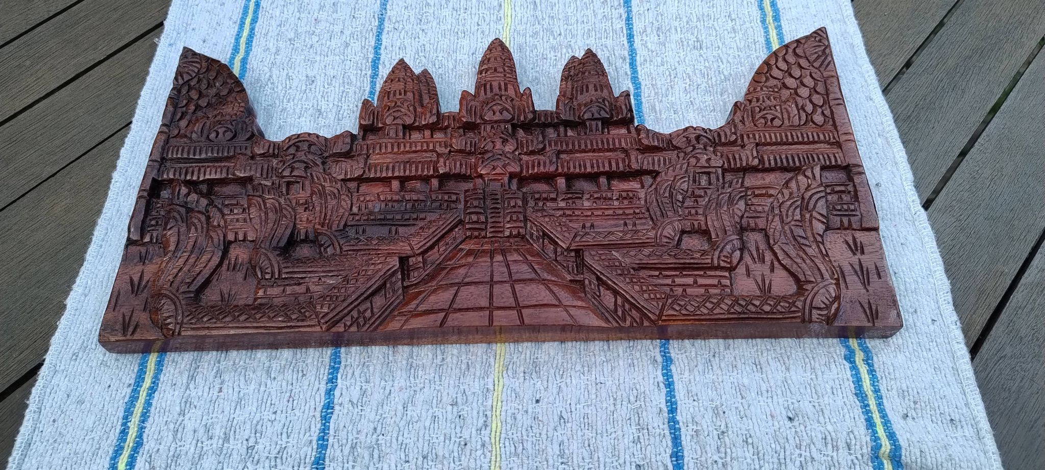 Carved wooden relief, reproduction of the Angkor Wat temple.