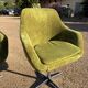 Vintage 1960s Lubke green velvet swivel armchair pair.