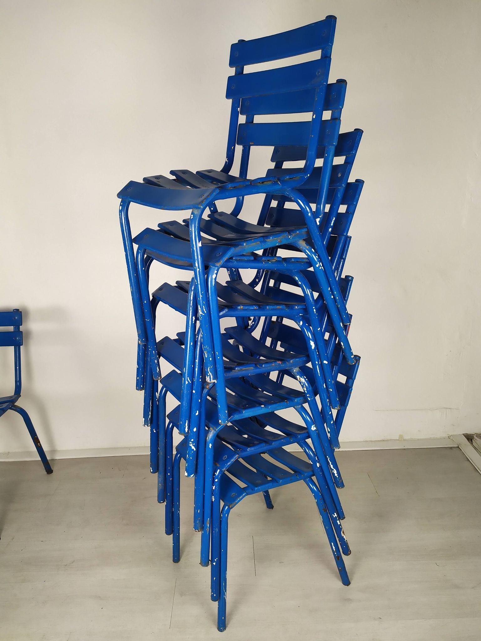 14 blue metal bistro chairs