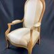 Fauteuil Voltaire XIXe en hêtre blond époque Louis-Philippe