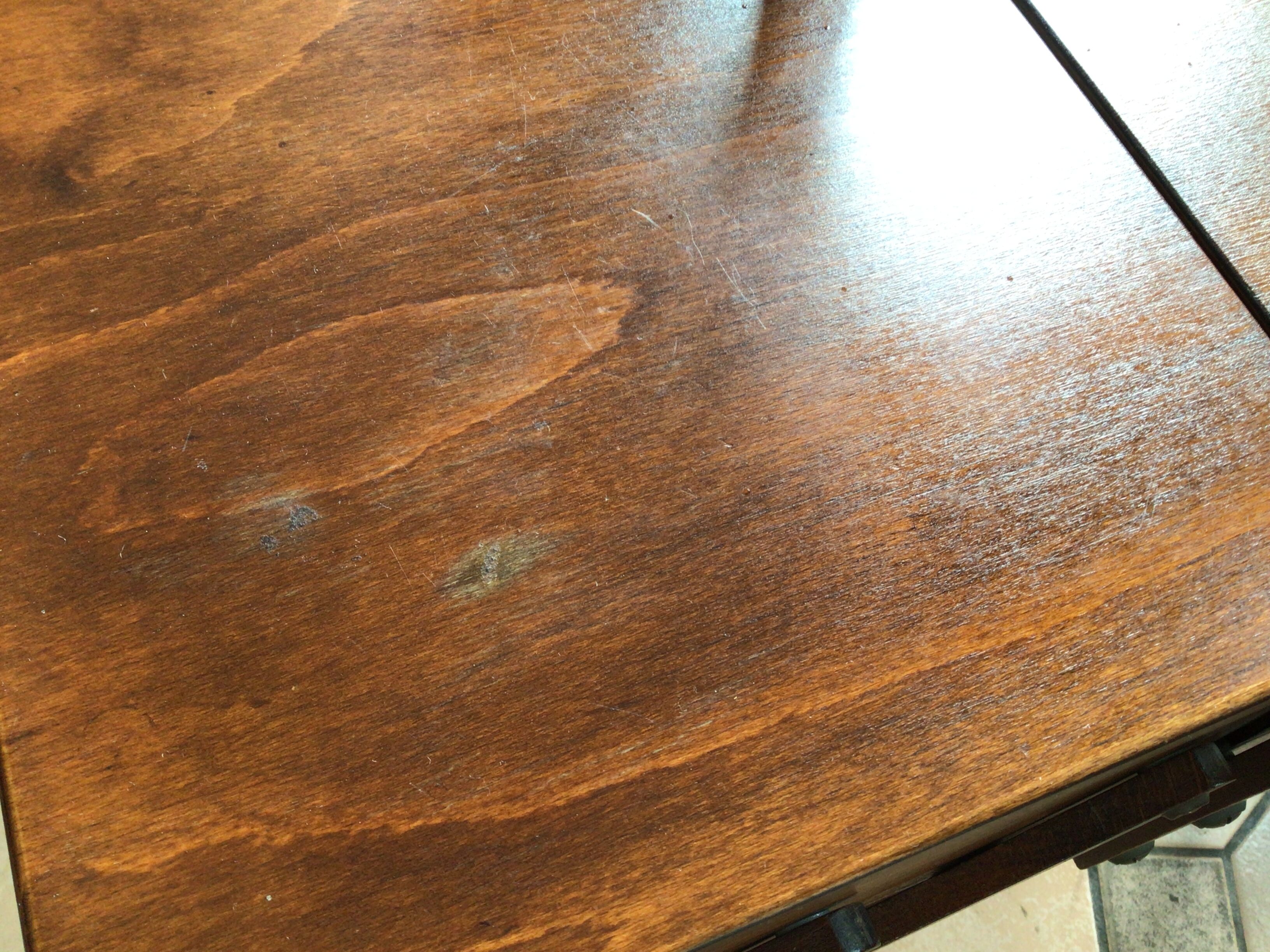 Worker on wooden compass feet